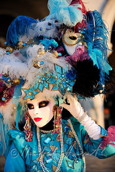 disguised woman at the carnival