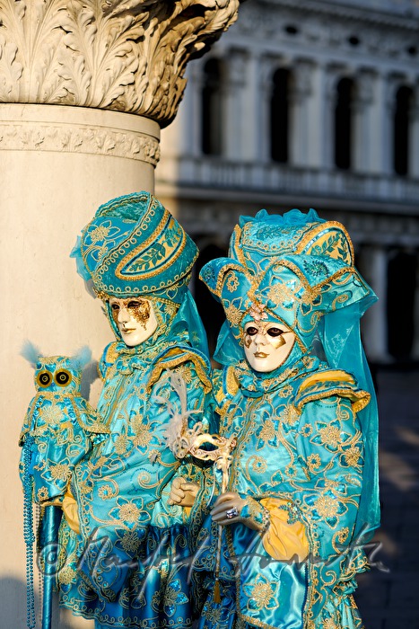disguised couple at the carnival