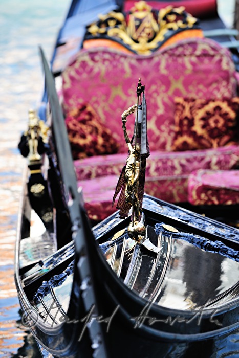 golden figurine of a gondola