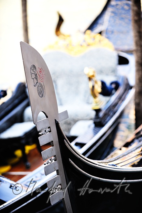decorated blade on the bow of a gondola