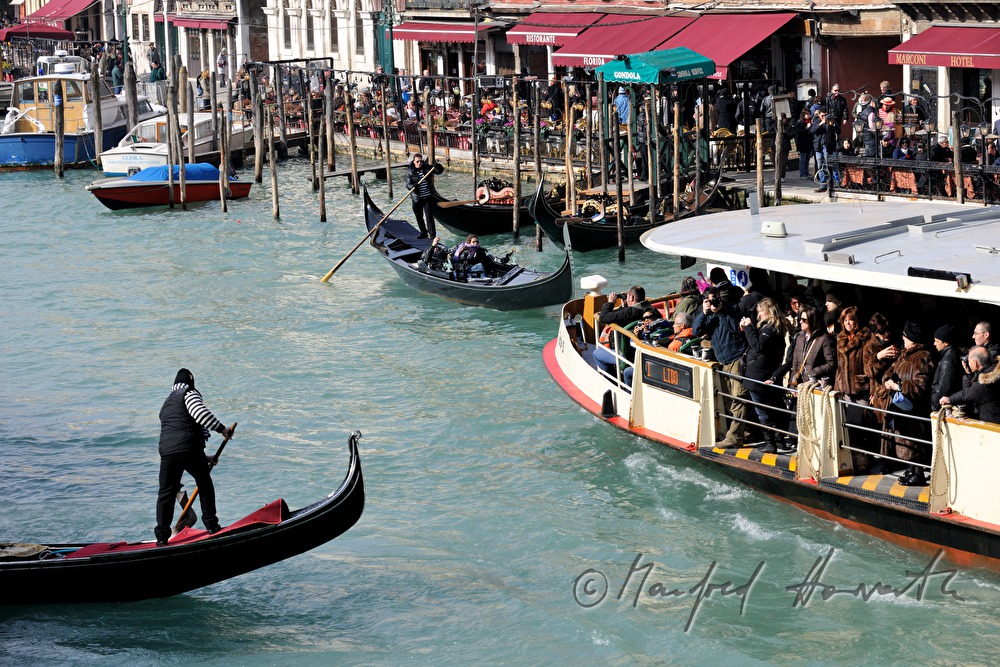 gondolas and ferry on the Canal Grande