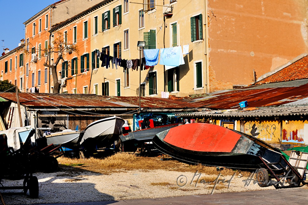 boats in front of a shipyard