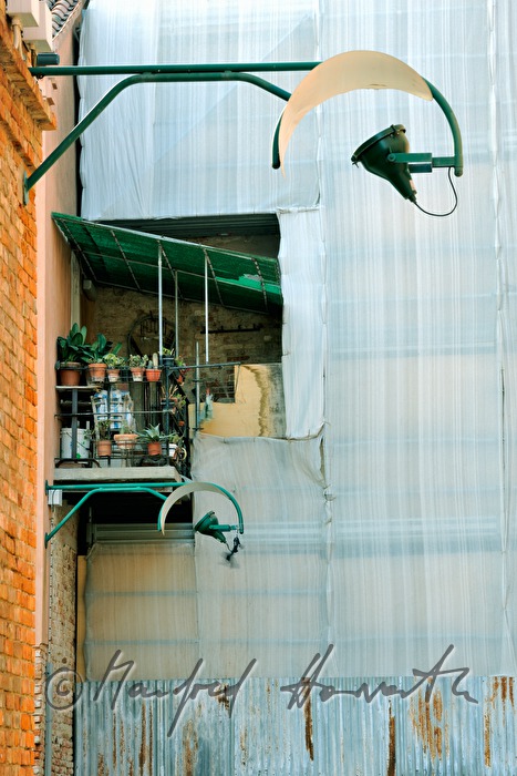 balcony of an apartment house with scaffold