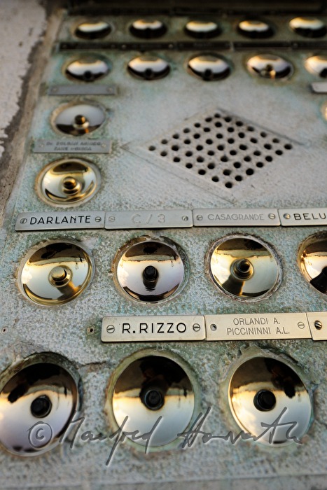 bells and nameplates at an apartment house