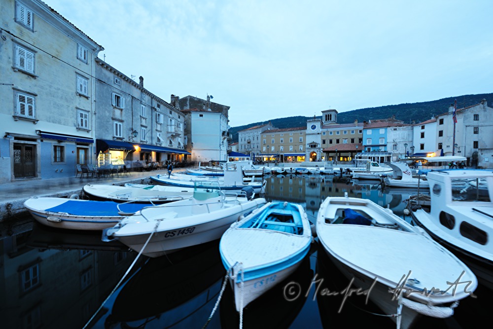harbour and boats in the town Cres