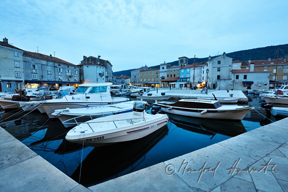 harbour and boats in the town Cres