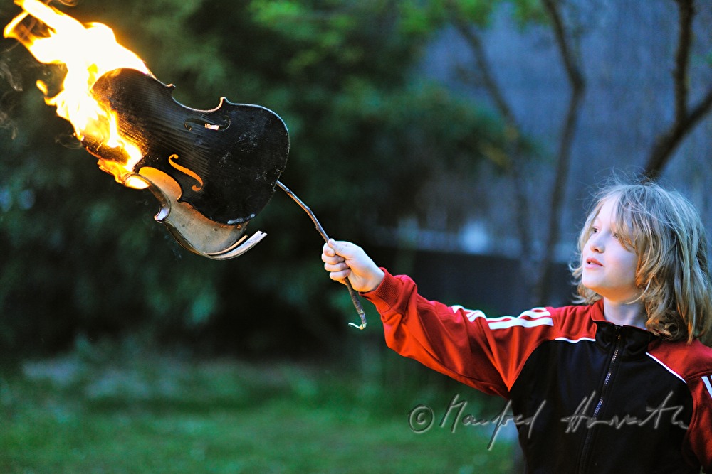 boy with burning violin