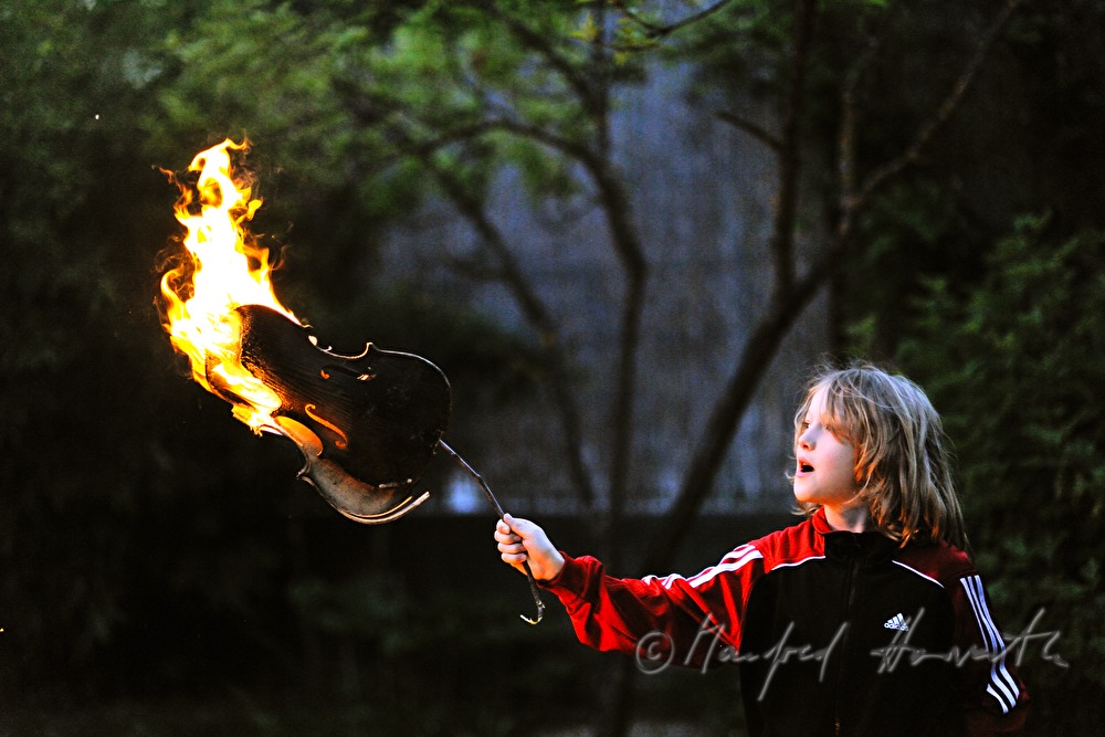 boy with burning violin