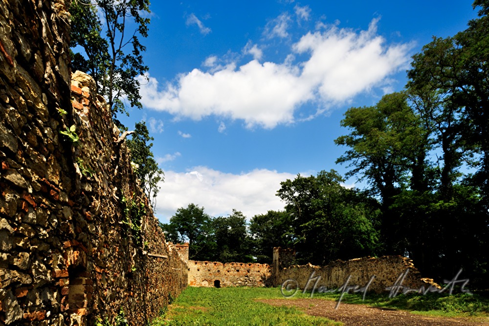 view through the arch of the entrance to the castle keep