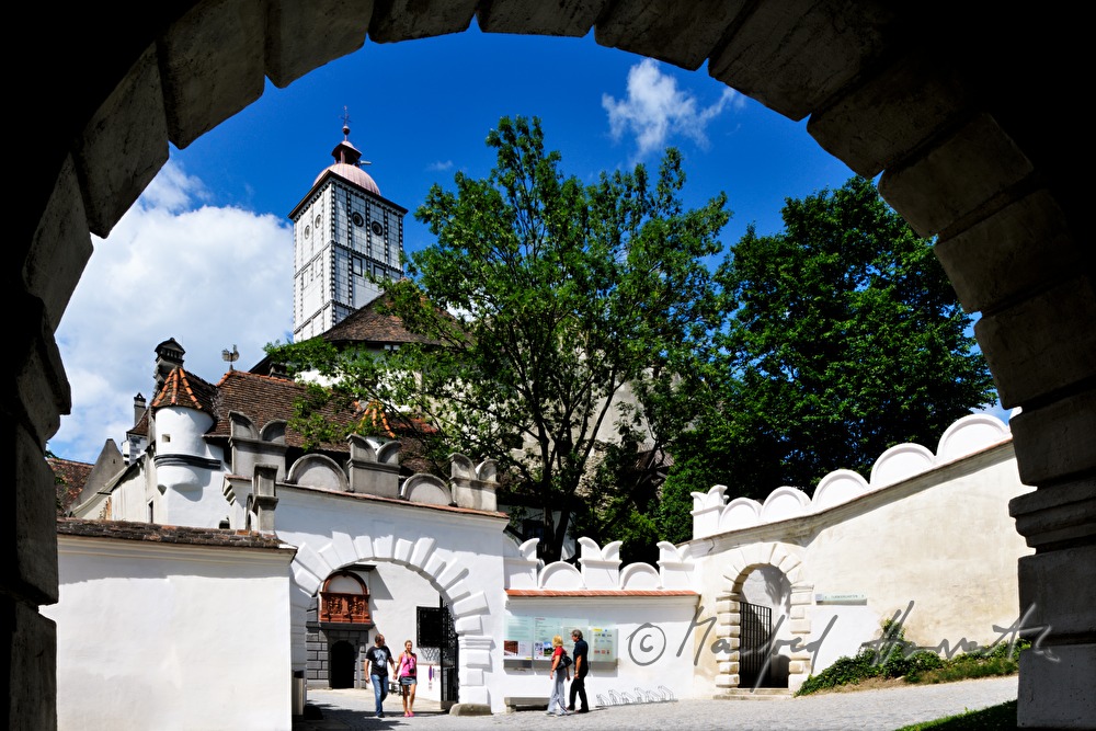 view through the arch of the entrance to the castle keep