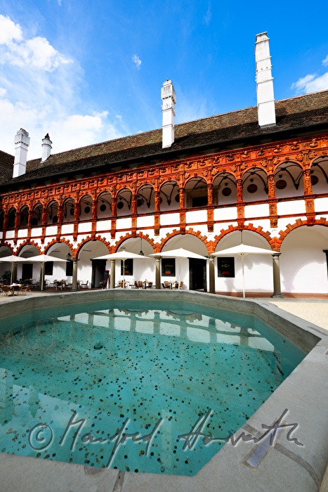 courtyard with columns made of terracotta from the Renaissance period