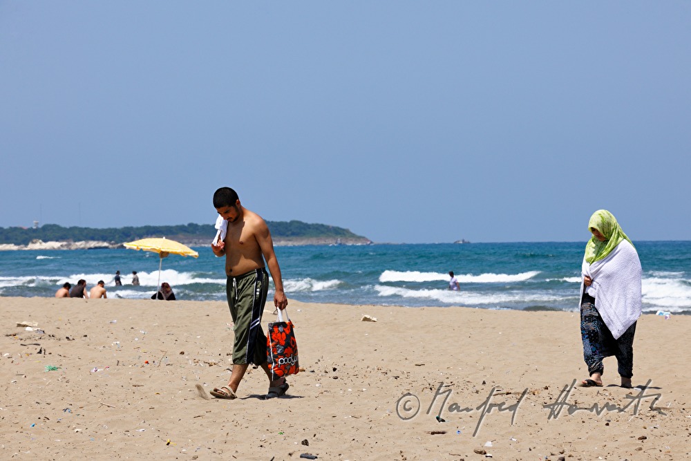 a couple on the beach of Kurfally