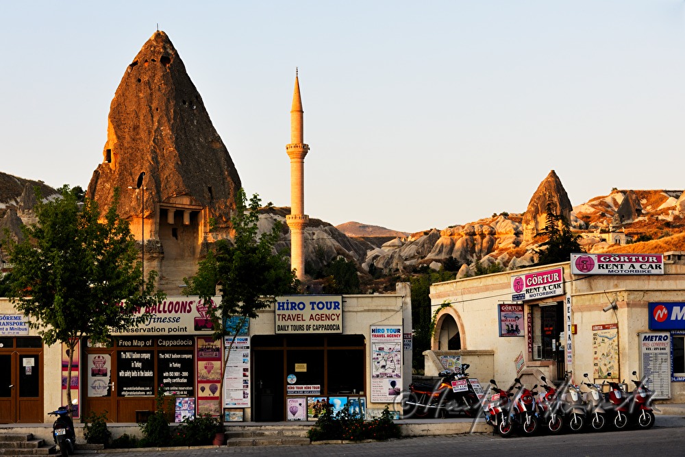 rock church Roma Kalesi and a minaret