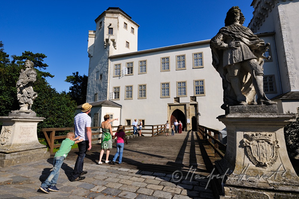 visitors entering the Museum of Prehistory