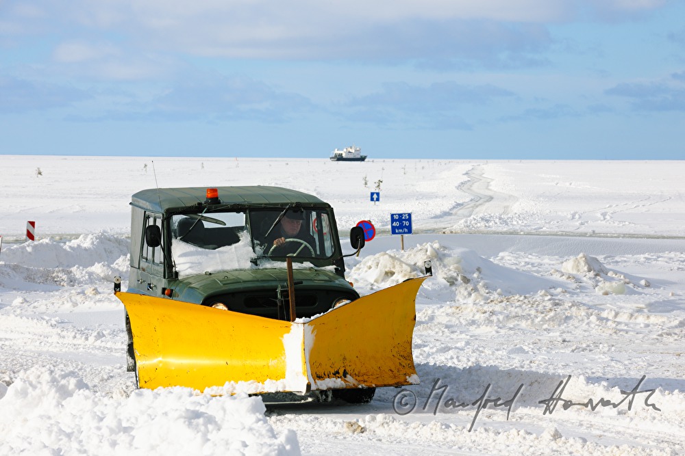 snow plough on the ice road to Vormsi