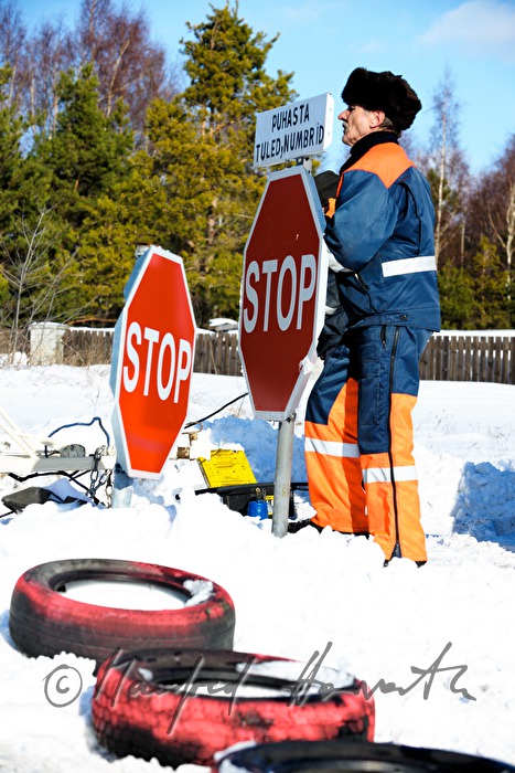 road worker with signs
