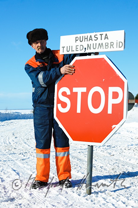 road worker with signs