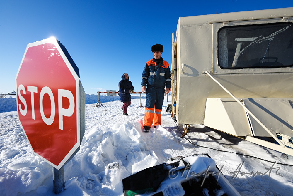 road worker with signs