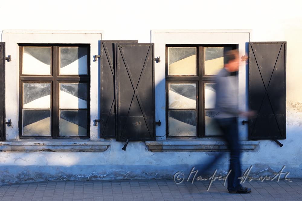 sandfilled windows of the artist's workshop