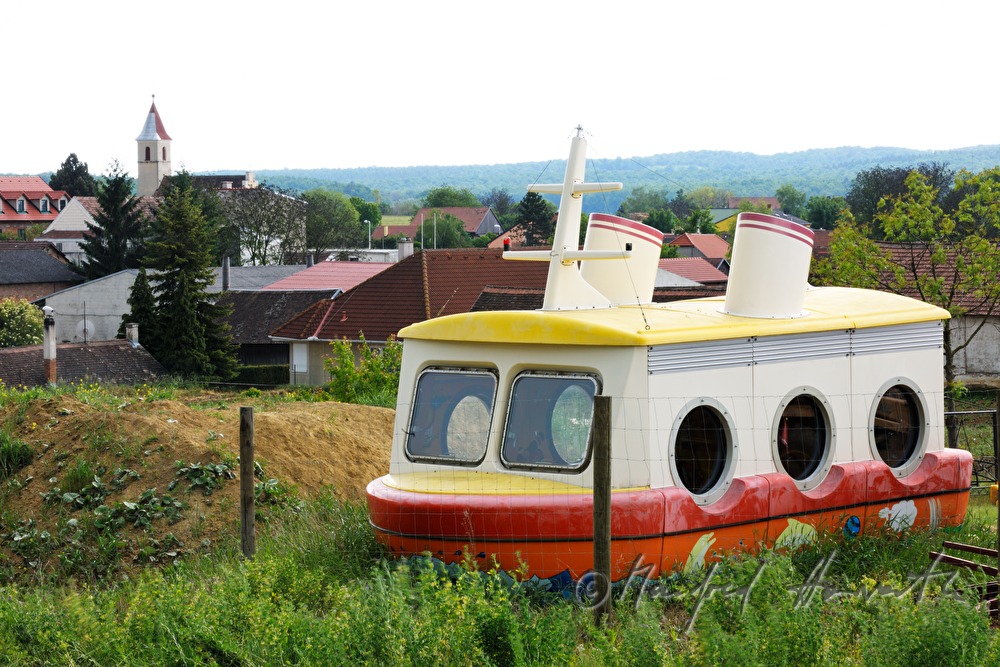 play yard with a plastic ship
