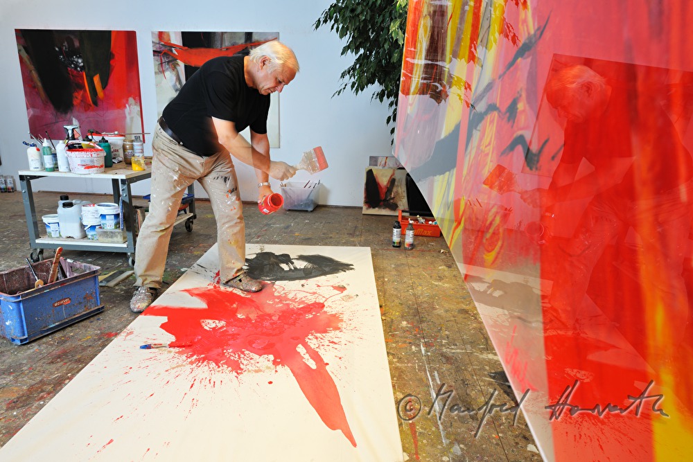 Sepp Laubner painting in his studio