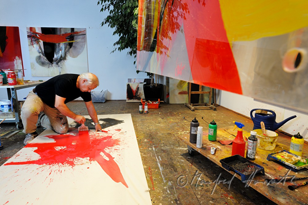 Sepp Laubner painting in his studio