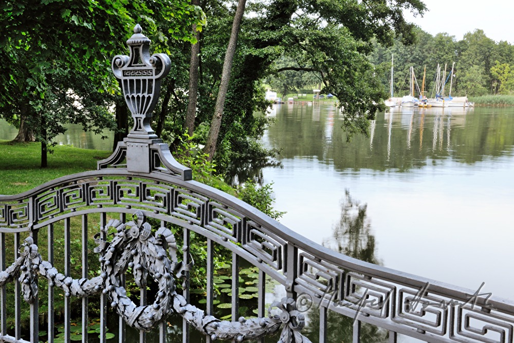 wrought iron bridge leading to castle island
