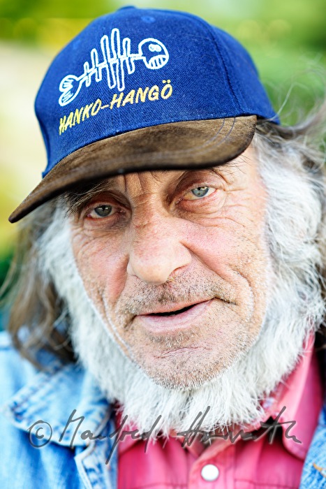 old seaman with baseball cap