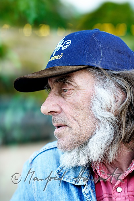 old seaman with baseball cap