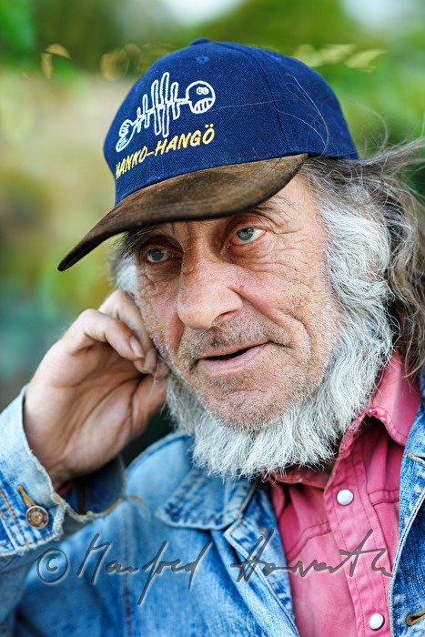 old seaman with baseball cap