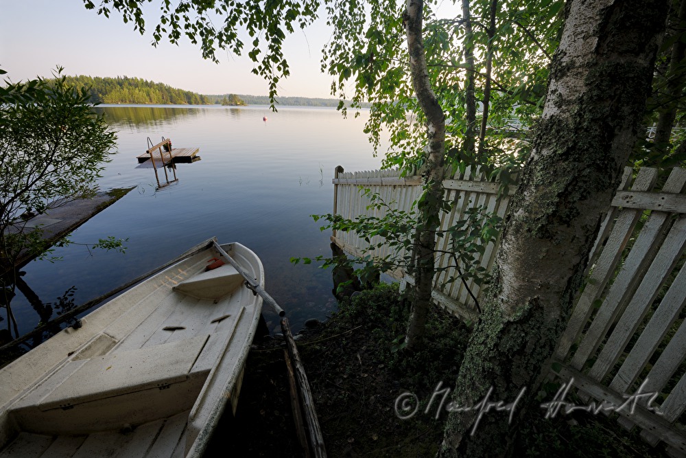 anchoring rowing boat on the shore