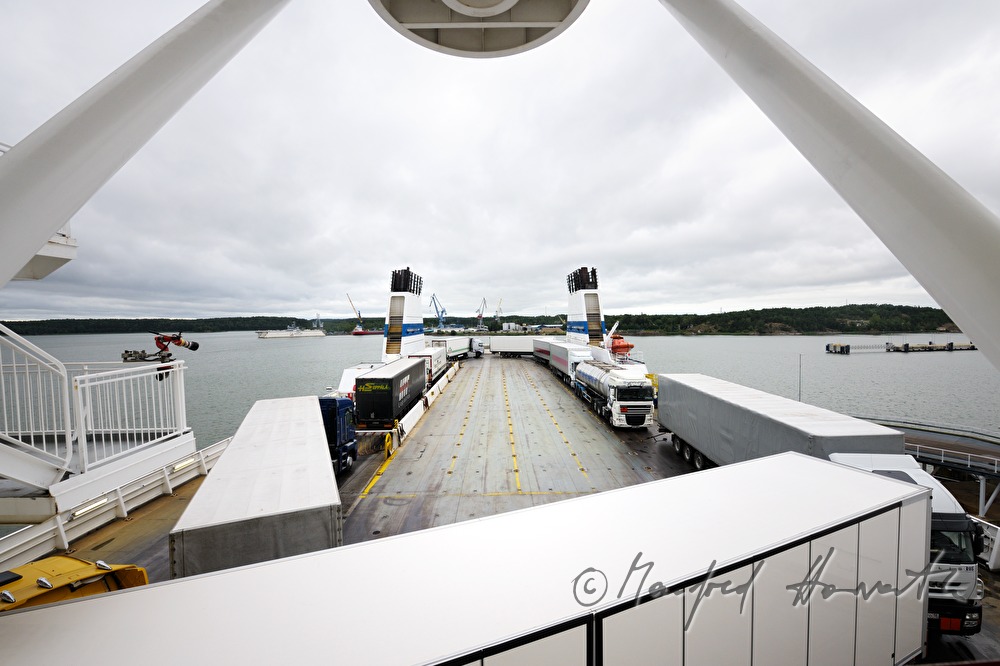 trucks on the parking lot of the car ferry