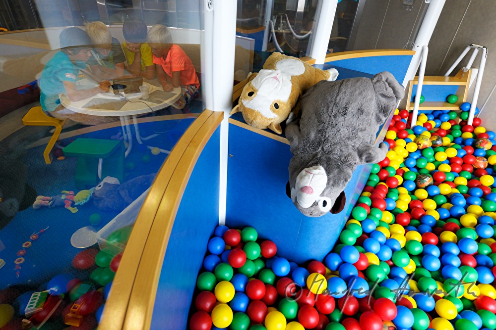 children watch TV in the play room of the car ferry