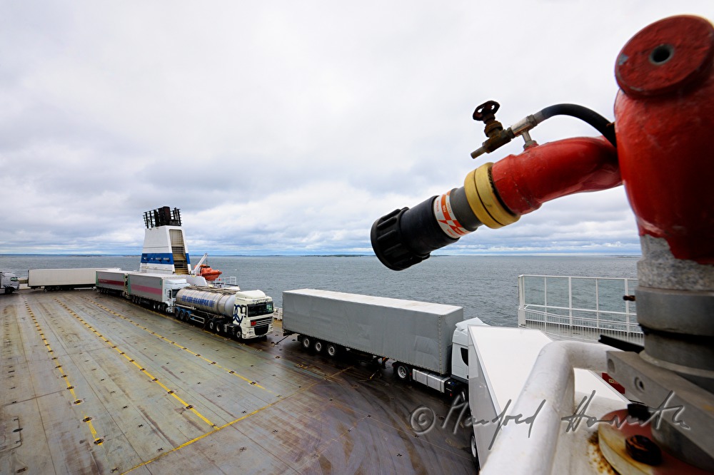 trucks on the parking lot of the car ferry