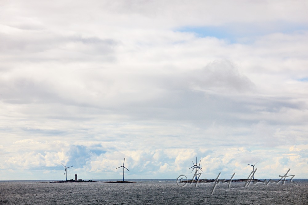 offshore wind mills on a small islet