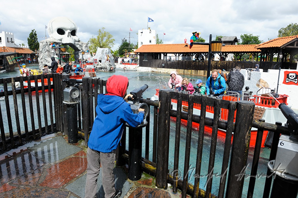 visitors having a water hose fight