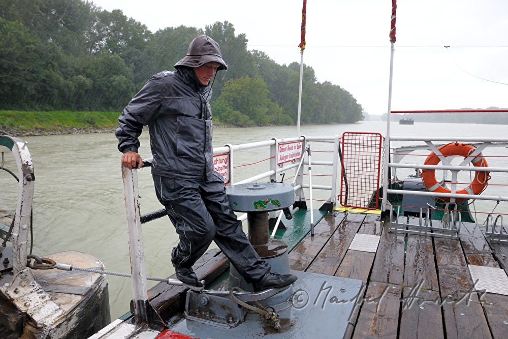 sailor closes the door after takeoff