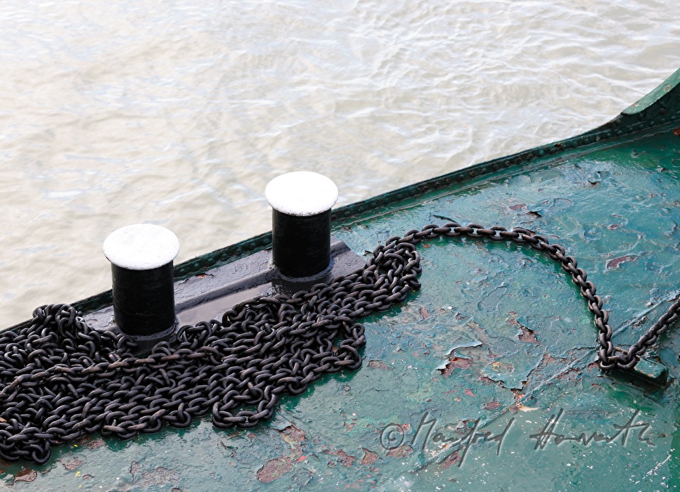 chain and bollards at the bow of the ferry