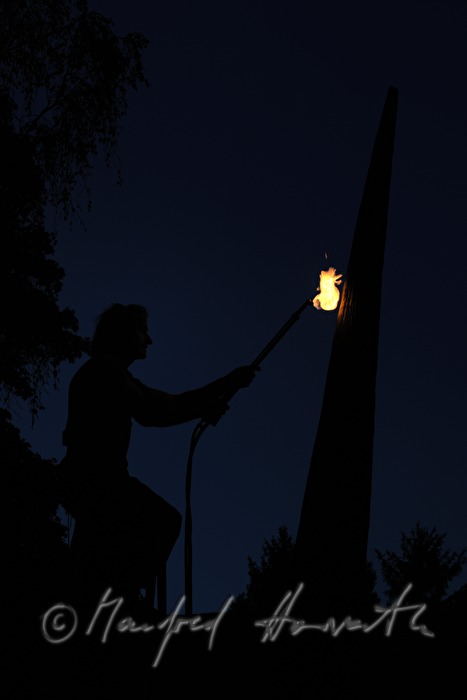 sculptor Johann Feilacher working a sculpture