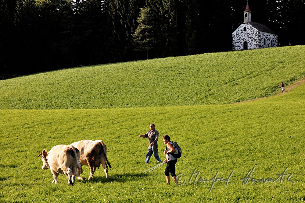 cowboy and wanderer near the chapel