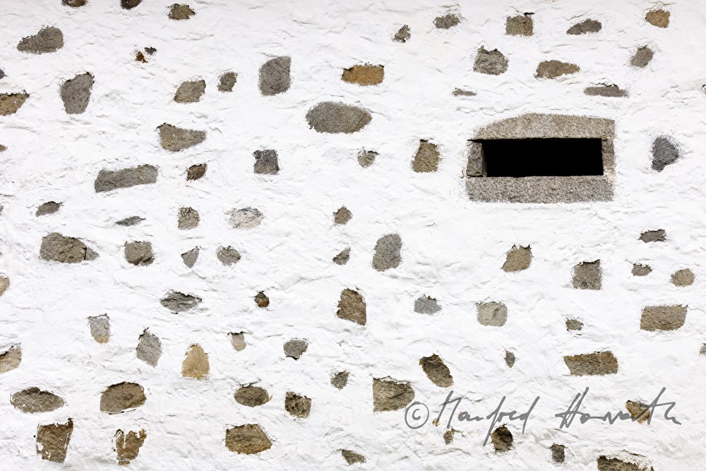 window of a cowbarn formed like a slot