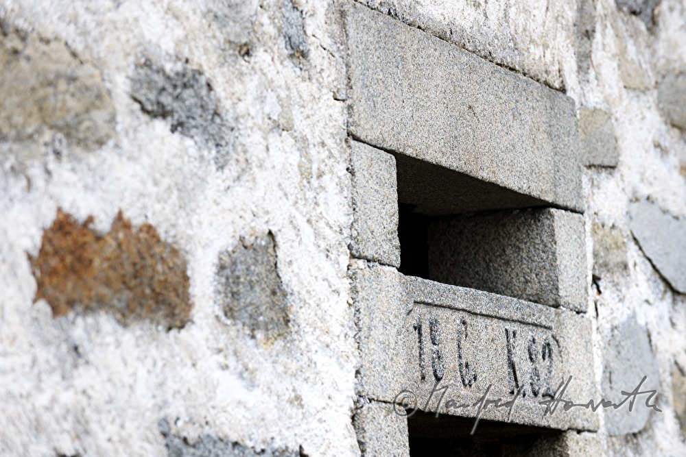 window of a cowbarn formed like a slot