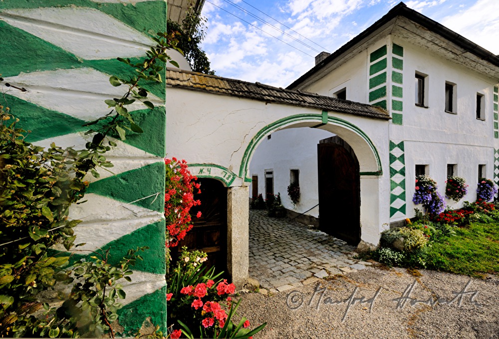 farmhouse with green painting