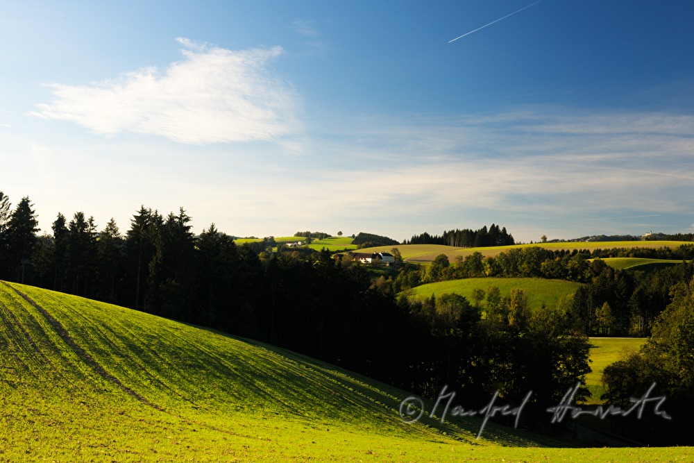 farmhouses on a mountain ridge