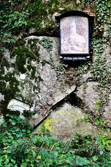 picture of the Blessed Virgin Mary on a rock