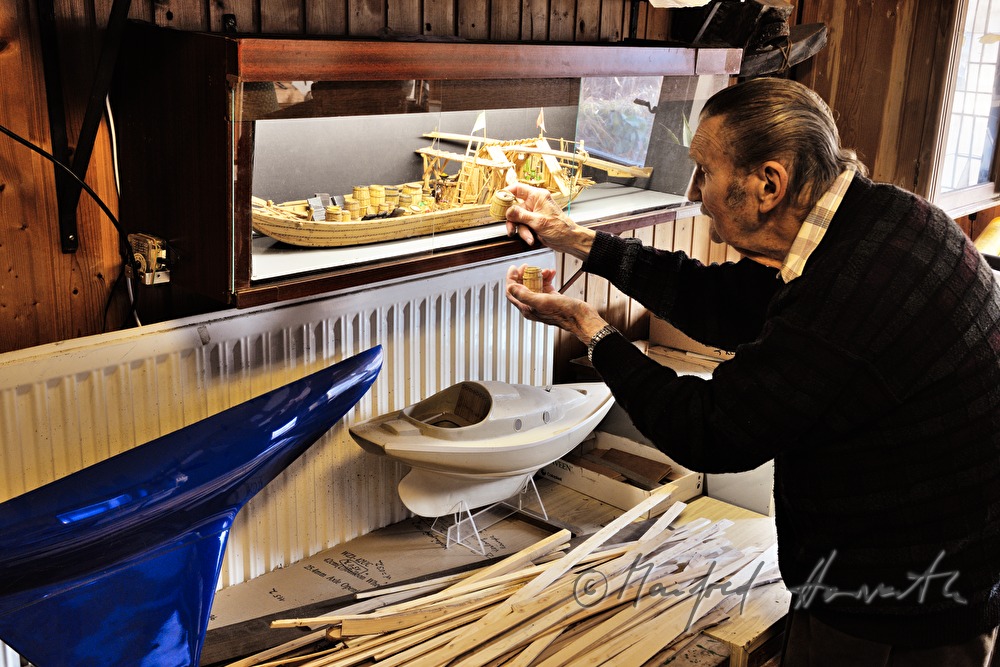 ship scale model maker Kurt Schaefer with showcase