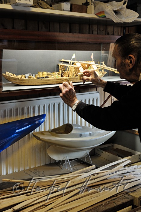 ship scale model maker Kurt Schaefer with showcase
