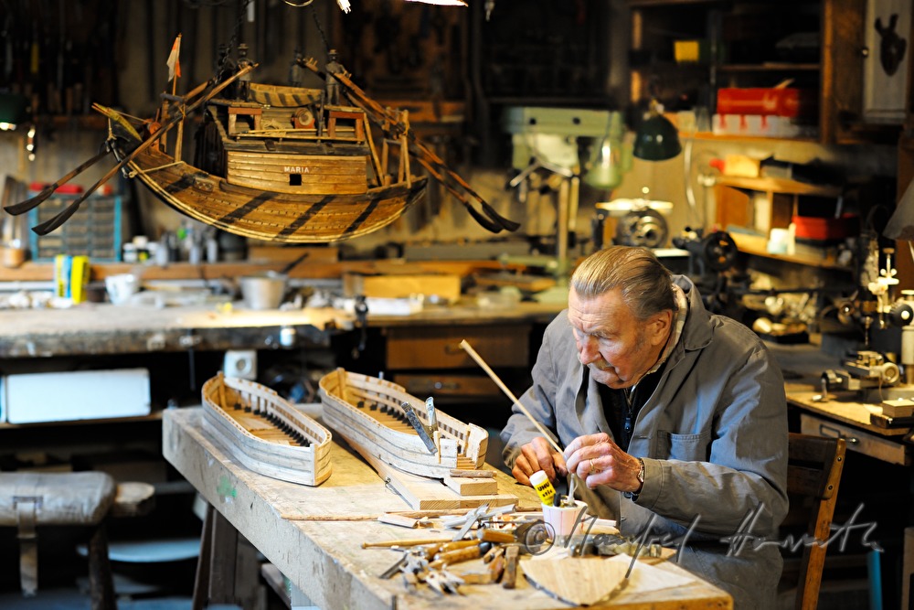 ship scale model maker Kurt Schaefer in his workshop