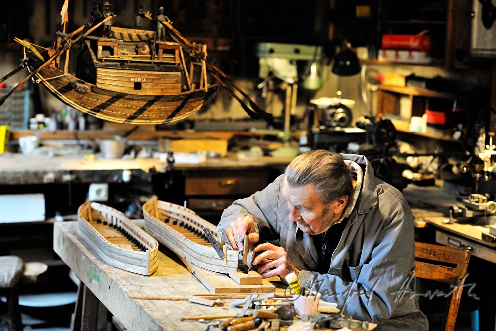 ship scale model maker Kurt Schaefer in his workshop