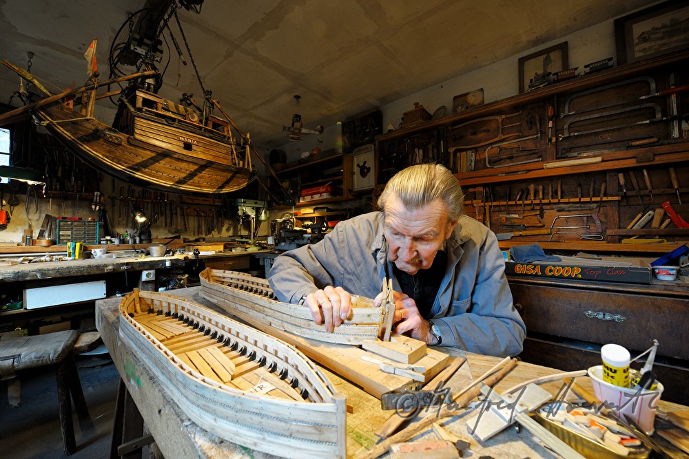 ship scale model maker Kurt Schaefer in his workshop